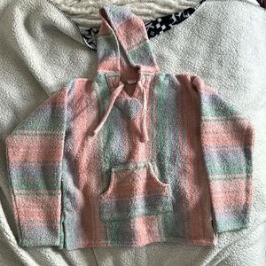 Pastel pink blue and green drug rug